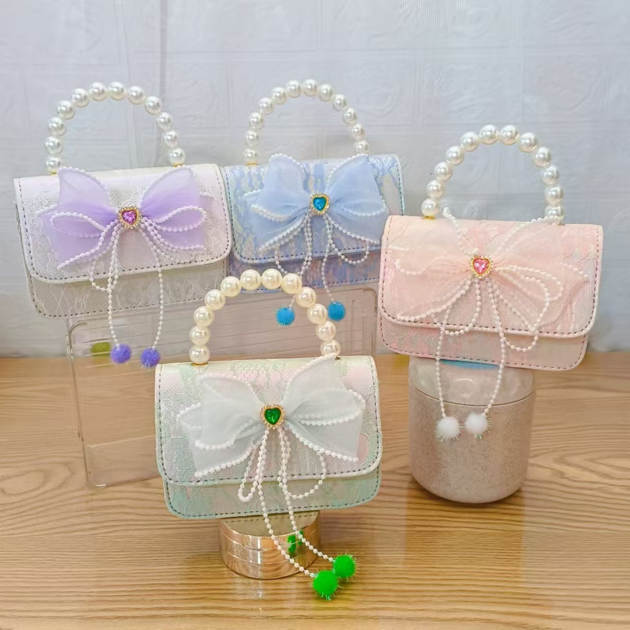 Bolsa de arco princesa bolso de perlas bolso de mano cadena bolso de cinturón pequeño viento bolso de niñas bolso de regalo del día de los niños bolso pequeño