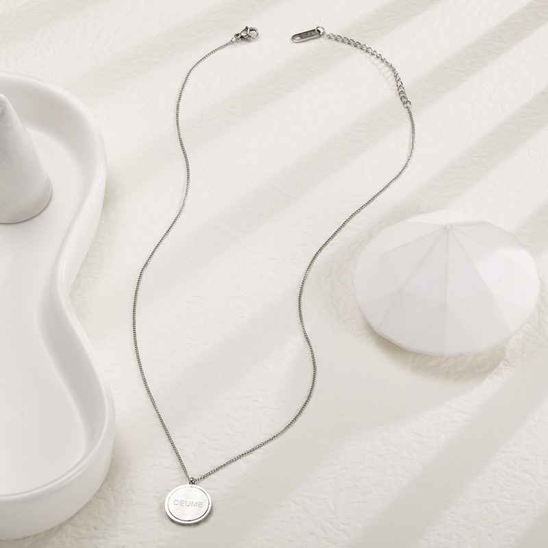 Oferta especial experiencia europea y americana joyería de acero titanio vacío galvanoplastia no decoloración no alérgica joyería pendientes collar fábrica al por mayor