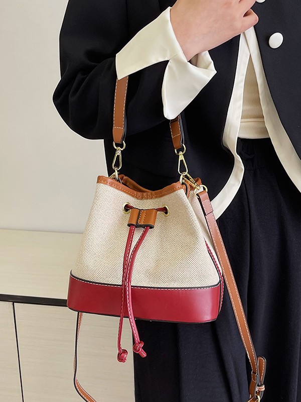Bolso tote tipo cubo de lona con bloques de color para mujer, nuevo modelo de comercio exterior, bolso de hombro cruzado con cordón texturizado estilo moda urbana.