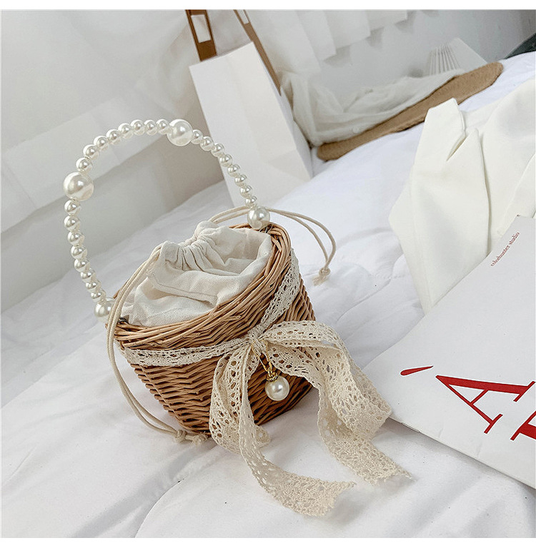 Fashion Round Straw Pearl Portable Bag display picture 19