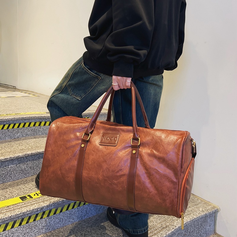 Bolsa de viaje de hombre transfronteriza de estilo europeo y americano, bolsa de maleta de gran capacidad, bolsa de fitness a prueba de salpicaduras.