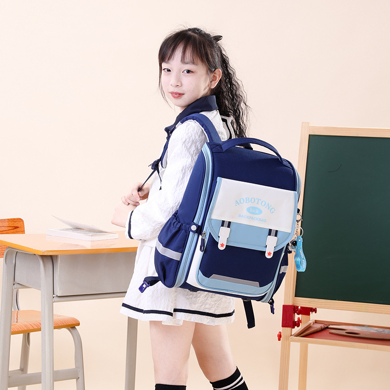 Natural Fish 2025 nuevas mochilas escolares para niños y estudiantes de grado 1-3 versión coreana de gran capacidad para reducir la carga y proteger la columna