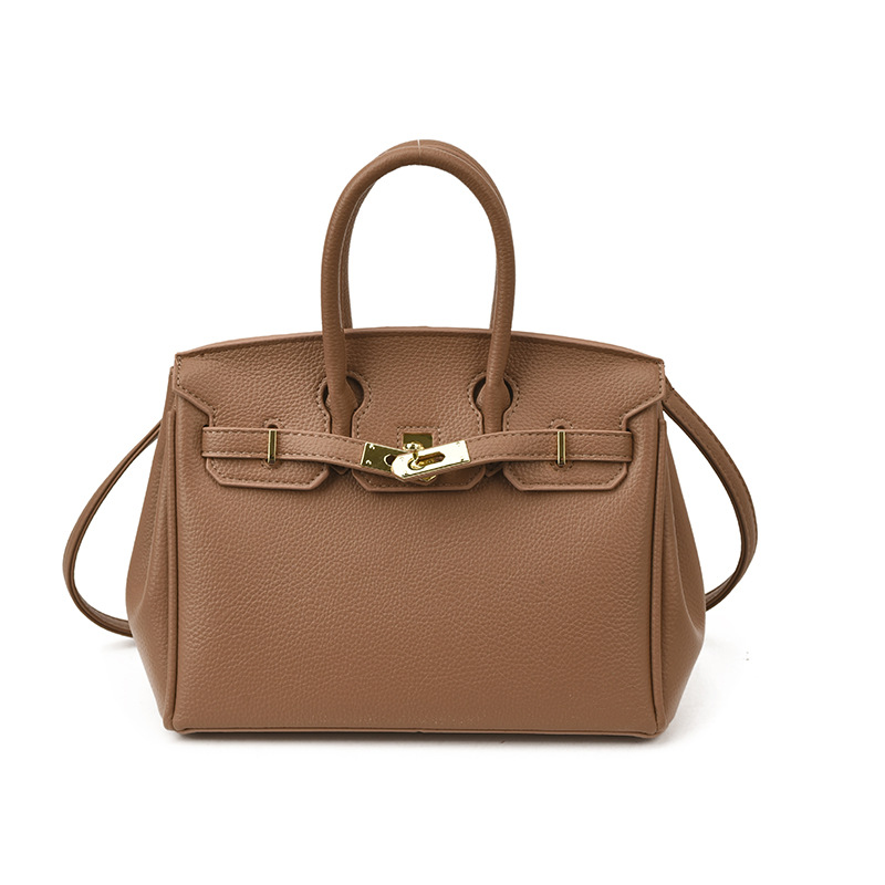 Bolsos de platino retro retro de alta calidad para mujeres 2026 comercio exterior nueva moda litchi pattern commuter mochila versátil