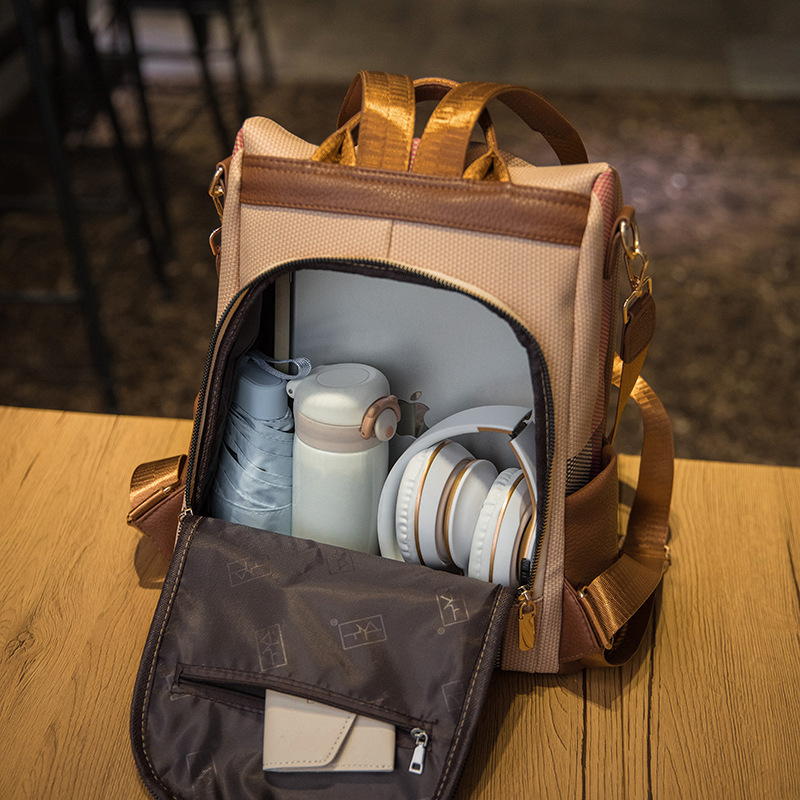 Nueva mujer nicho mochila elegante estilo de diseño de color colgante bolsa de viaje multifuncional mochila de gran capacidad