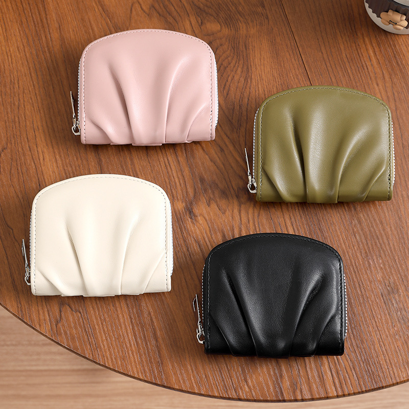 2024 nuevo pliegue sensación de billetera de mujer simplista lindos japoneses y coreanos pequeños bolsos de cambio multifuncional billetera en línea