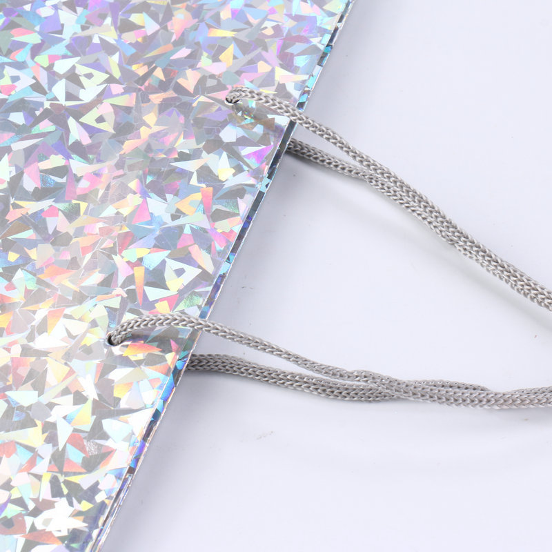 Cool papel de bronce láser bolsas de papel de mano de alta sensación de color láser regalo de cumpleaños bolsa de regalo de vacaciones