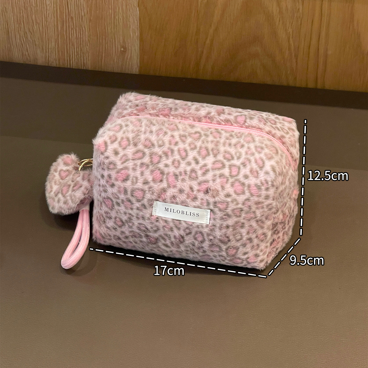Nueva bolsa de maquillaje impresa de leopardo de peluche de pelo de conejo multifuncional portátil otoño y invierno para salir bolsa de almacenamiento de lavado de gran capacidad