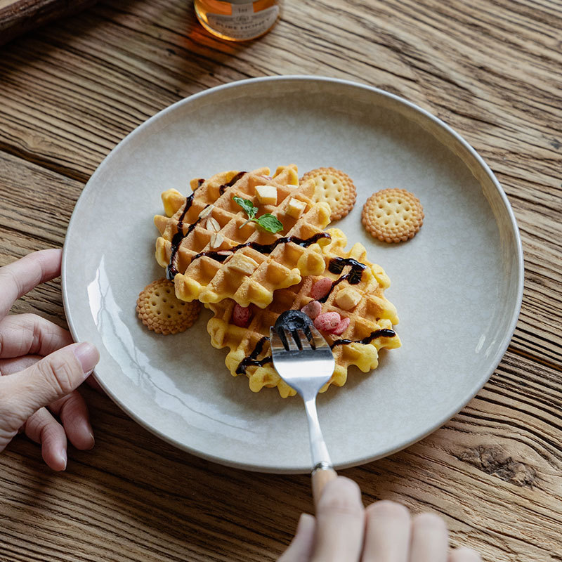 Plato de cerámica de alto valor de superficie, plato de piedra de nieve, plato de comedor doméstico, plato de platos, platos de platos de comedor al por mayor