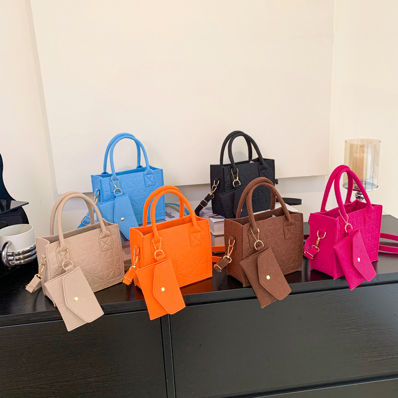 Moda de gran capacidad bolso de las mujeres de estilo coreano simple sangría sentía bolso ligero de dos piezas al por mayor