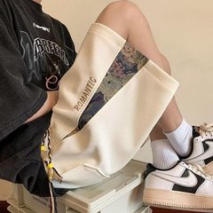 国潮高街刺繍カジュアル半ズボン男性夏2025新作ファッションブランドのデザイン感があります。