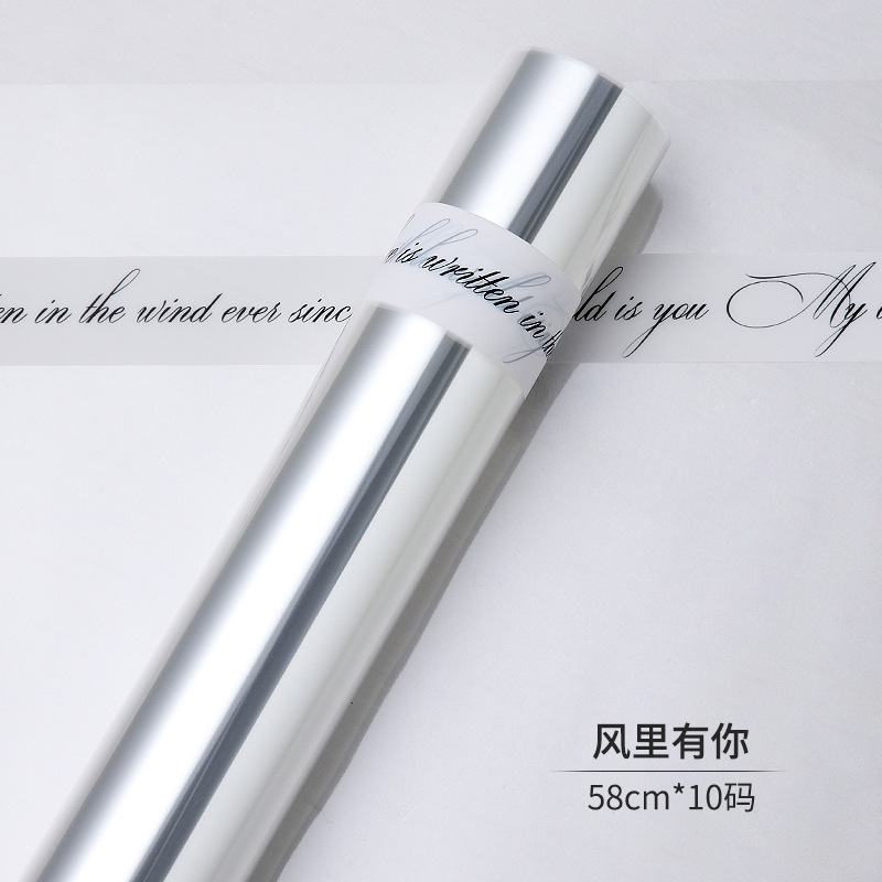 Celofán a prueba de polvo al por mayor opp forro de plástico de papel de embalaje de flores paquete de ramo celofán transparente en stock