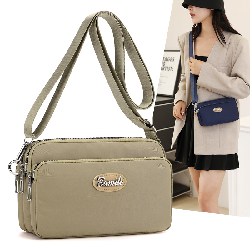 2025 nuevo estilo coreano moda transfronteriza todo fósforo Oxford tela bandolera bolso pequeño ligero casual de hombro para mujer