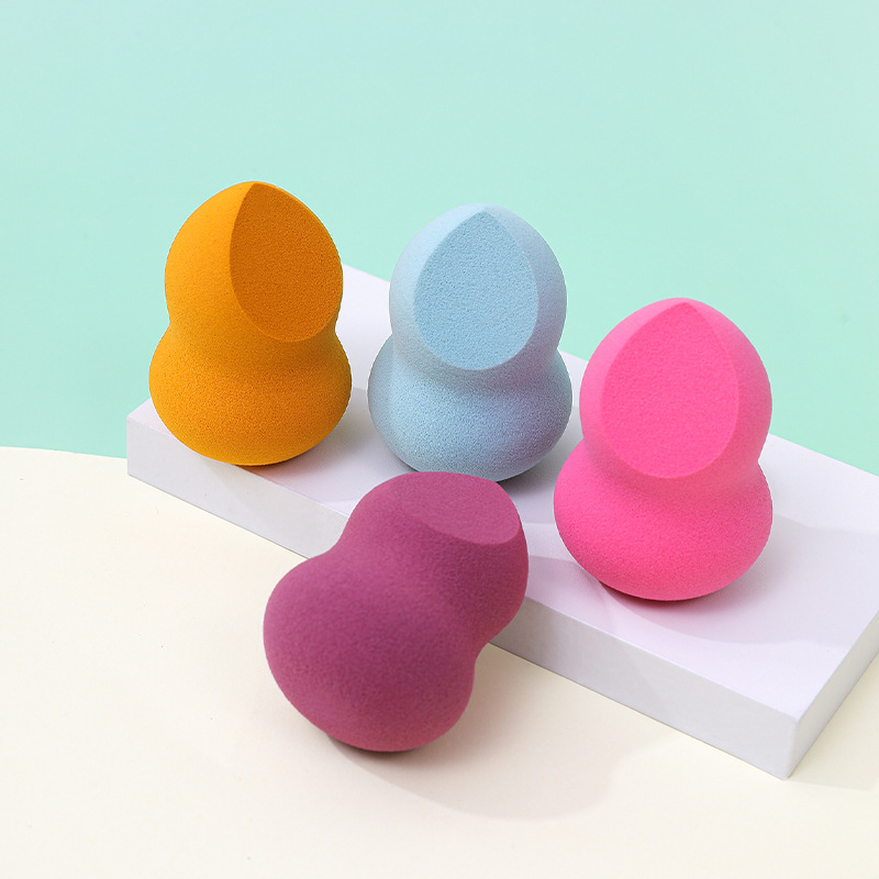 Fábrica personalizada cortar un cuchillo de polvo de maquillaje de huevo no comer polvo en forma de calabaza de poliuretano esponja de maquillaje de huevo de maquillaje