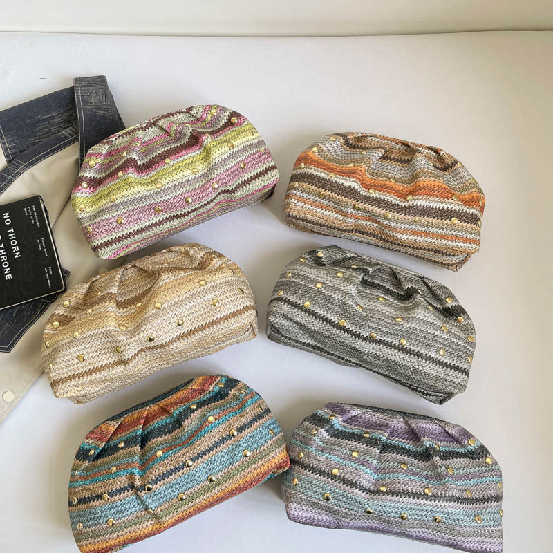 Verano nuevo temperamento versátil simple plegado estilo estilo extranjero alto sentido de nicho sentido de diseño bolso de mano ligero para mujeres