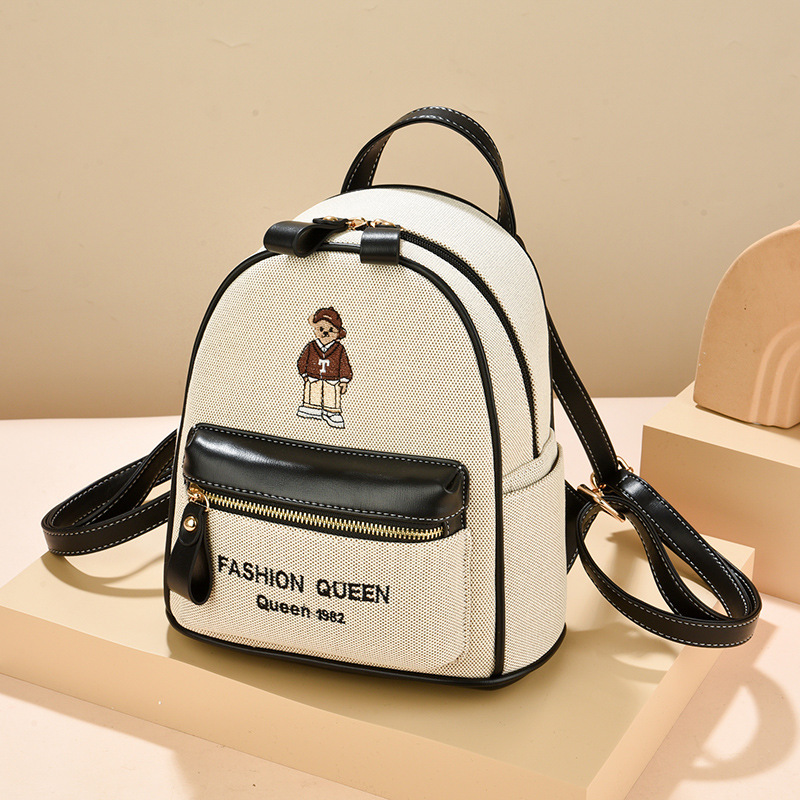 Mochila mujer 2025 nuevo estilo estudiante universitaria modelo de dibujos animados mochila de viaje mochila de gran capacidad de doble uso