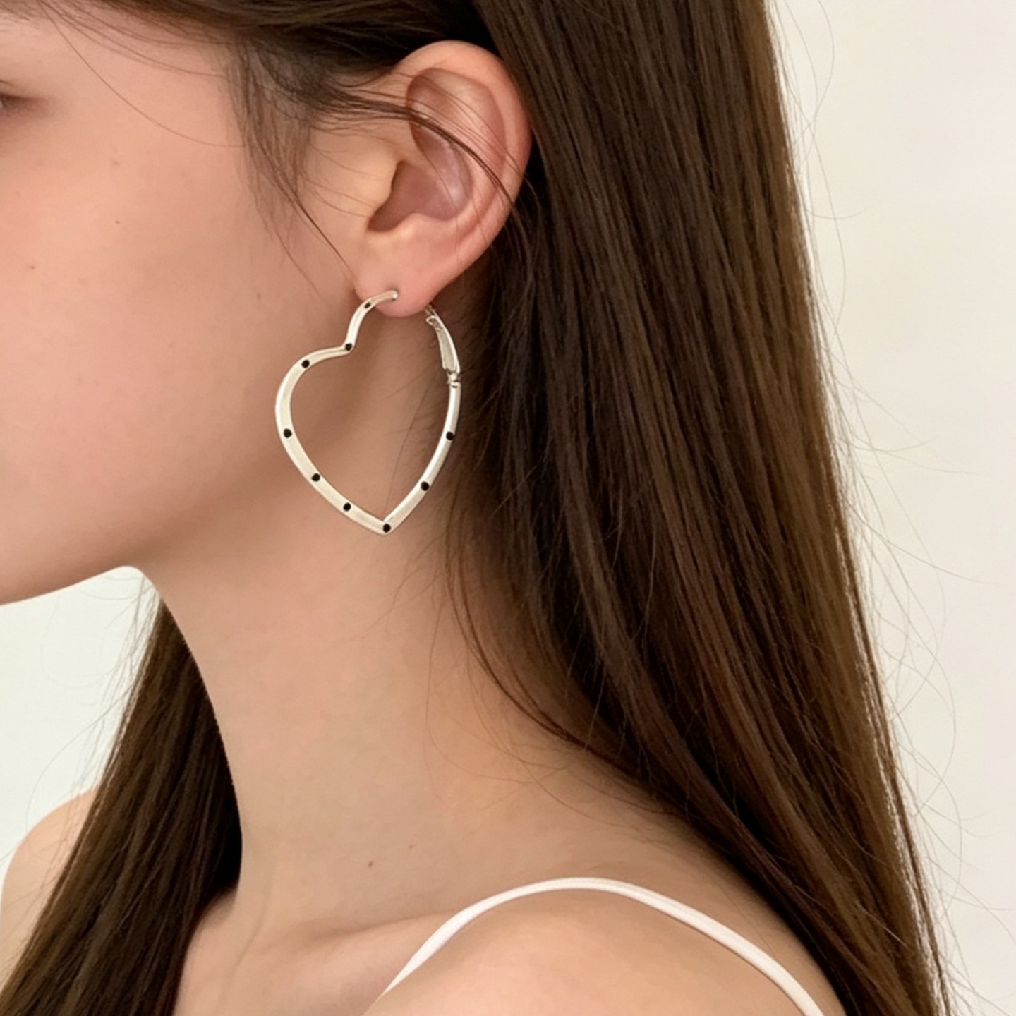 Sweet and lovely polka dot earrings, a stunning and unique design, perfect for women. These heart-shaped stud earrings offer a sophisticated and trendy look
