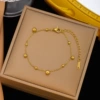 【E129】Big and small beads; bracelet; gold