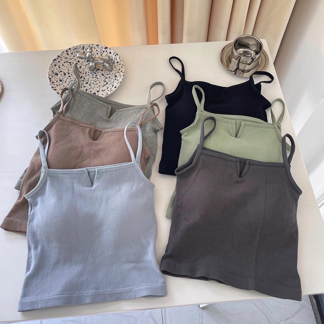 Nuevo estilo de la belleza de nuevo pequeño cuello en V camisola versátil desgaste exterior superior americano nicho estudiante fijo Copa ropa interior