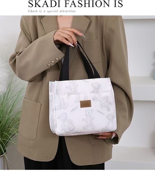 New handbag bento for mommy and office workers. Oxford cloth with rice for work. Fashionable lunch box with large capacity undefined