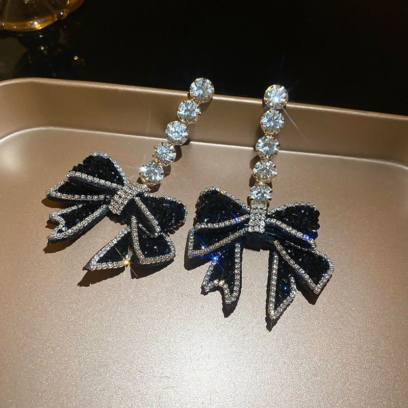 55# silver needle-gold-black-bow