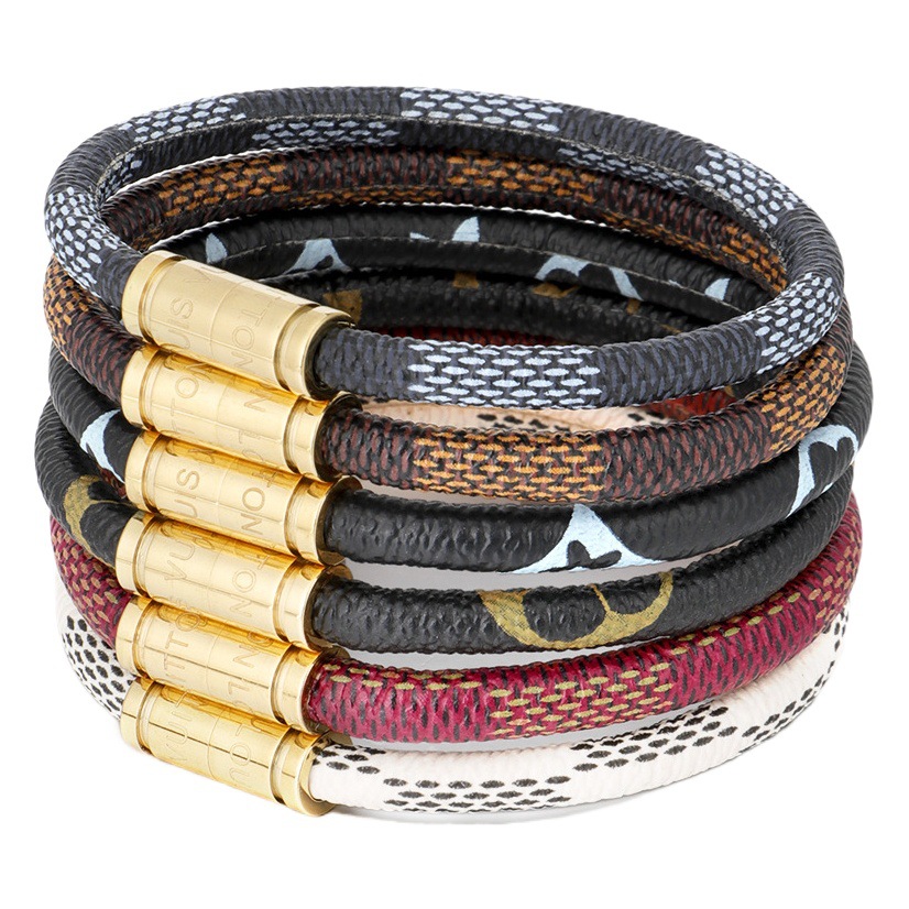 Comercio electrónico transfronterizo Letras de acero de titanio de Europa y América Pulsera de cuerda de piel de vaca de color antiguo Hebilla magnética de acero inoxidable para hombres y mujeres Pulsera de pareja