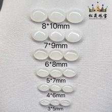 合成白玉髓椭圆形和田白玉旦形平底素面光面蛋面裸石戒面镶嵌