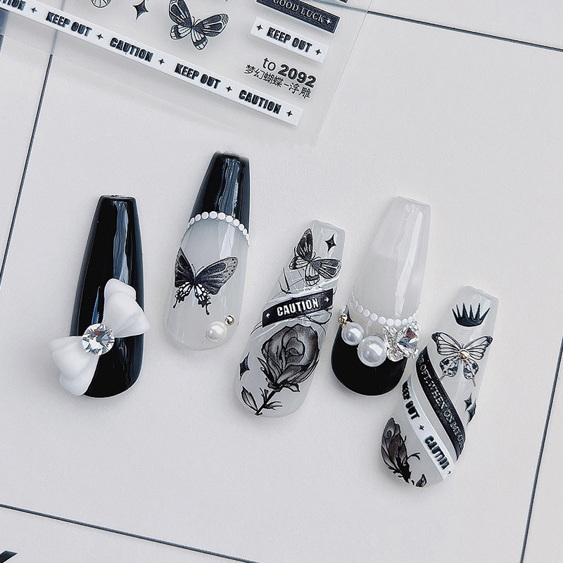 Tomoni en línea estilo de celebridad pegatinas de uñas cinta estilo de Chanel alivio mariposa letras inglesas estilo oscuro textura de uñas