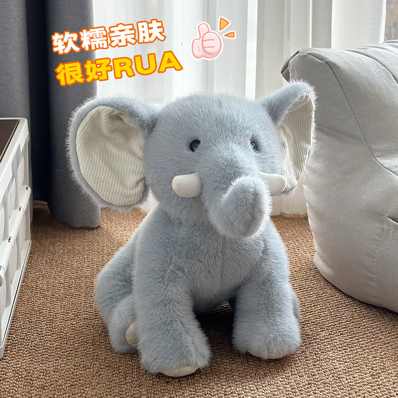 Muñeca de elefante de peluche muñeca niña niño mono linda niña sosteniendo una muñeca grande para dormir