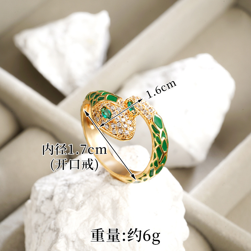 Brazaletes de serpiente de arena transfronteriza de 18 quilates, anillos de cabeza de serpiente de ojos verdes, joyas de mano chinas retro