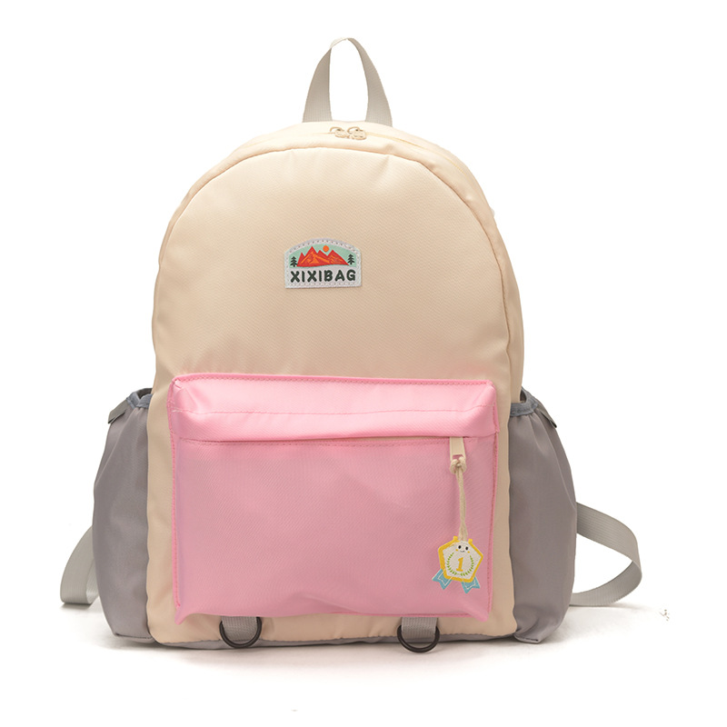 Jardín de infantes para hombres y mujeres, mochila de color extranjero, mochila de estudiantes de primaria de gran capacidad, 2026 nueva mochila infantil transfronteriza