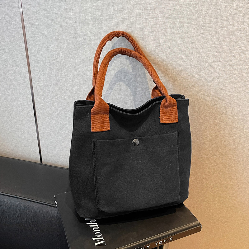 2024 nuevo bolso de lona para mujeres tela japonesa retro simple versátil Harajuku bolso de mano de color sólido casual de moda para mujeres