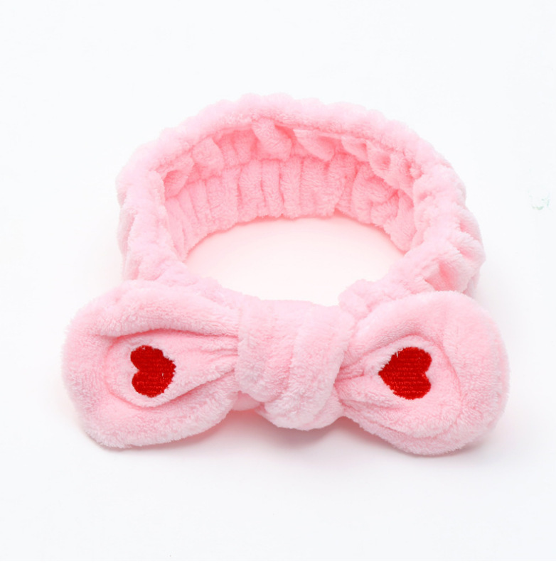 Celebridad en línea estilo coreano bordado pequeño corazón arco banda para el cabello deportes de las mujeres yoga pañuelo cara lavado banda para el cabello accesorios para el cabello al por mayor