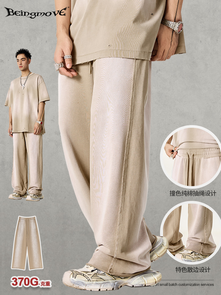 2025 marca de moda americana de verano rociado tinta blanqueante rociado lavado con agua para hacer viejos pantalones de baile callejero de bordado exclusivamente para hombres transfronterizos