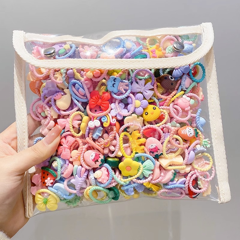 La cuerda del pelo del bebé de las muchachas de la banda de goma de los niños no lastima el pelo Los accesorios del pelo del pulgar del tamaño pequeño atan la banda de goma del pelo