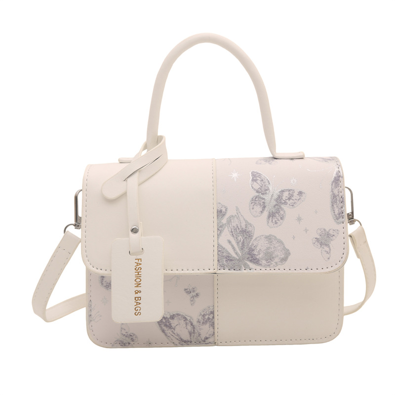 2026 nuevo paquete de hombro extranjero empalmado paquete de hombro de moda simple bolso de mano casual bolso pequeño transfronterizo