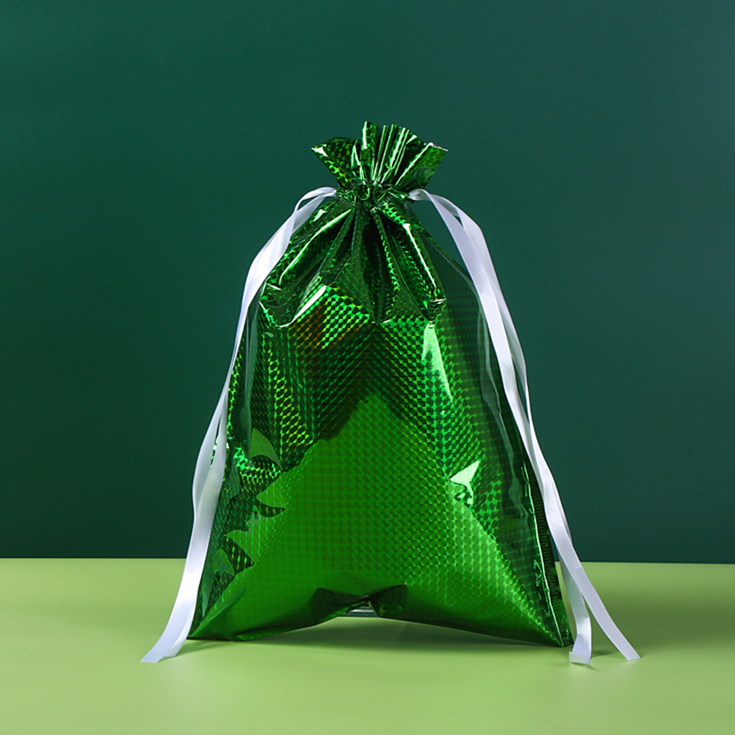 Inventario de cinta de cuerda de dibujo bolsas de dulces de plástico bolsas de regalo frescas bolsas de láser bolsas de regalo Navidad