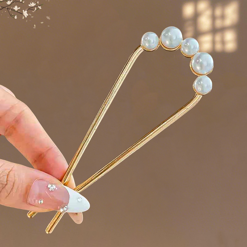 Temperamento en forma de U pinzas de pelo japonesas y coreanas 2025 nuevo simple pinzas de cabello de cabeza de cabeza de bola de cabeza de cabello de cabello