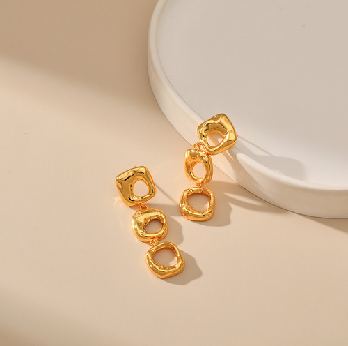 Irregular hollow design niche heavy industry metal high-end feel earrings brass plated 18K gold color retaining long earrings