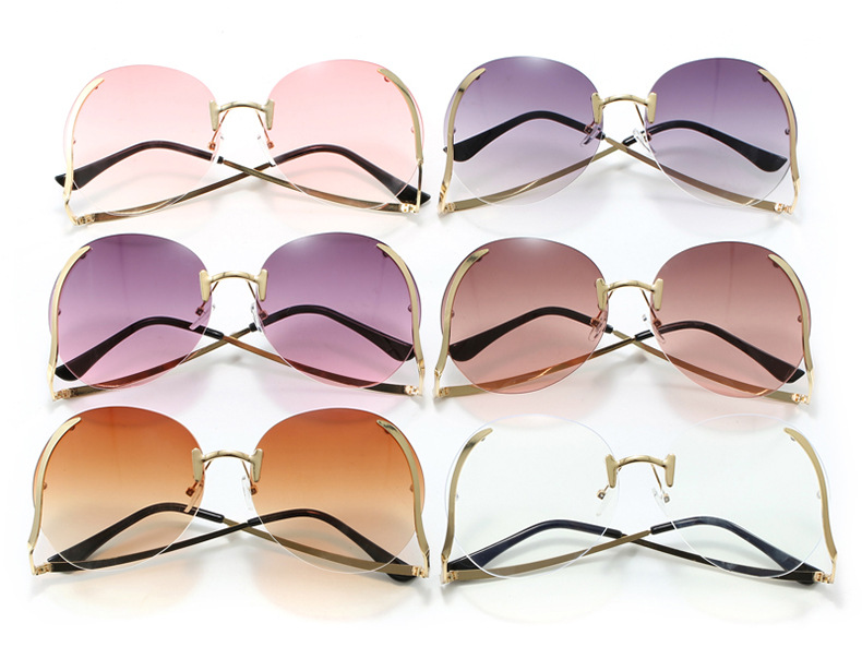 45g Weight Frameless Glasses Structure Sunglasses Classification PC, UV400 Protection Lens Material Round Frame Glasses Style Travel, Fashion Wear, Sun protection Occasion Solid Color Pattern All Seasons Season Women's Gender Personality, Exaggerated, Street Style Personality Exaggerated Street Solid Color PC UV400 Protection Round Frame Frameless Women's Sunglasses 3