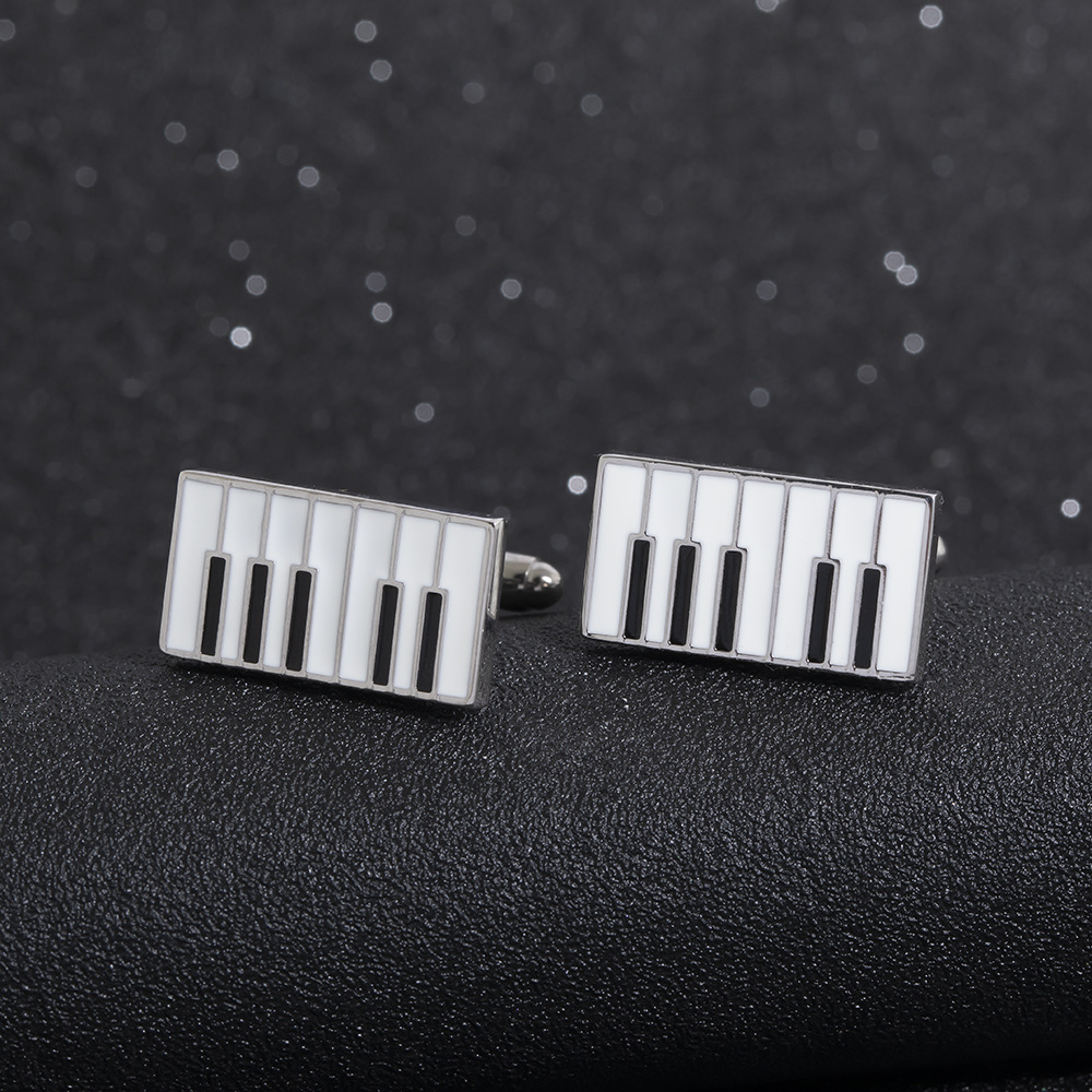 Gemelli in metallo per pianoforte di alta qualità, semplici chiodi a goccia in lega per polsini a righe bianche e nere all'ingrosso_voghion.com