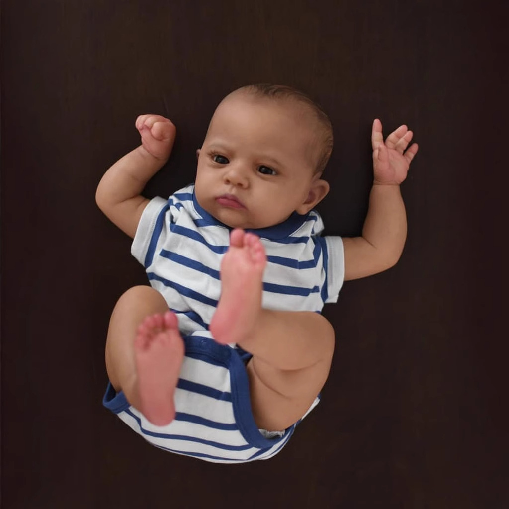 60cm cuerpo de tela de simulación renacer muñeca Cameron transfronteriza Venta caliente suministro negro bebé de una sola pieza de entrega
