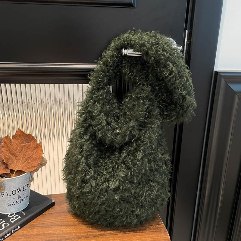 Nicho original de otoño y invierno bolsas de peluche vagabundos bolsas de hombro de chicas calientes de aire exterior rizado retro bolsas de moda