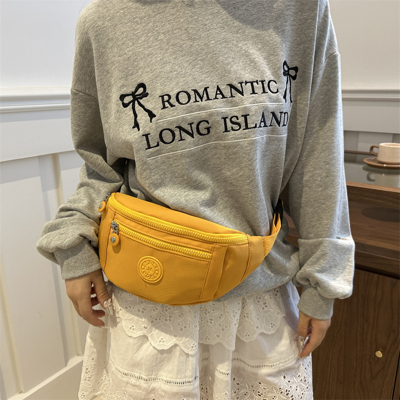 Nuevo nicho de diseño de bolso de cintura para hombres tendencia de personalidad estética 2024 verano almacenamiento de teléfonos móviles bolso de pecho de aire deportivo