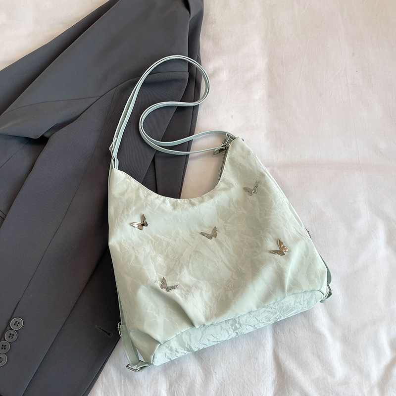 Tote Bag de mujer 2024 nueva mochila casual sensación de alto nivel multifuncional mochila de viaje ligera de hombro