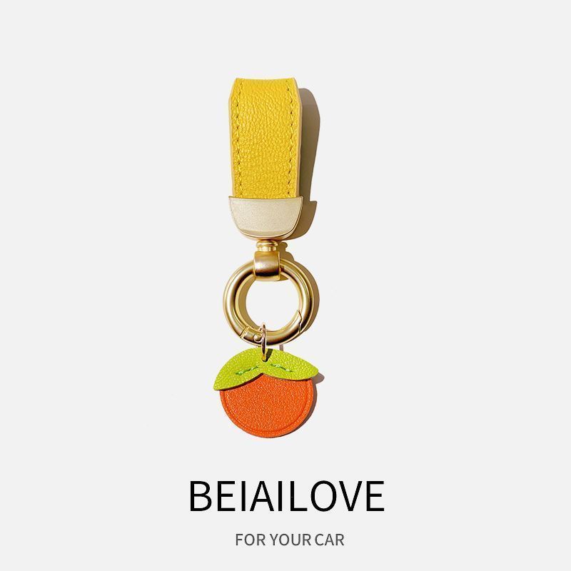 Estilo francés de alta gama de cuero fresco cuerda coche llavero simple lindo clave colgante Pequeño Libro Rojo mismo estilo girasol