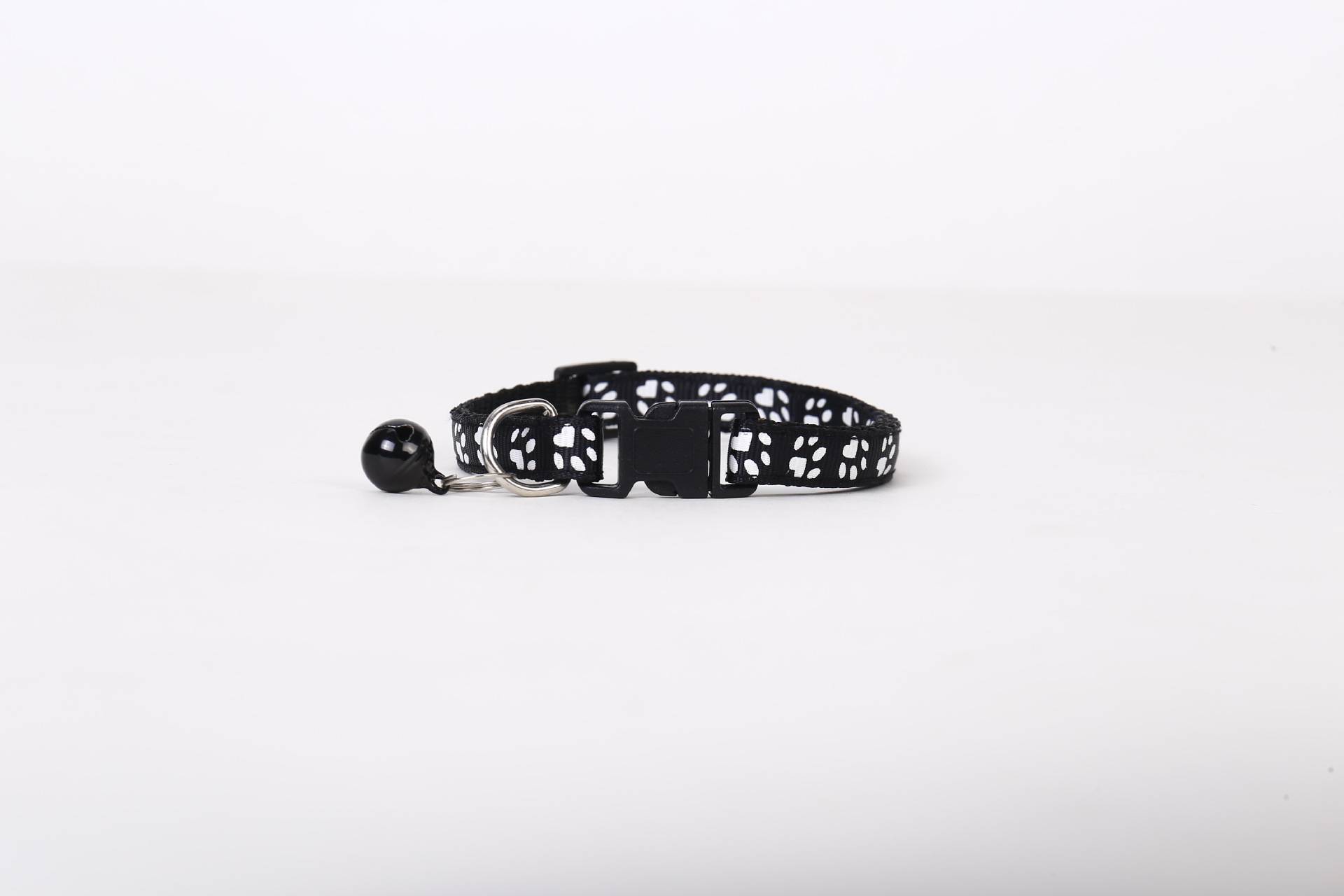 Collar de pegado de mascotas perros gatos una sola huella de pata impresa campana gatos brota gatito de nylon