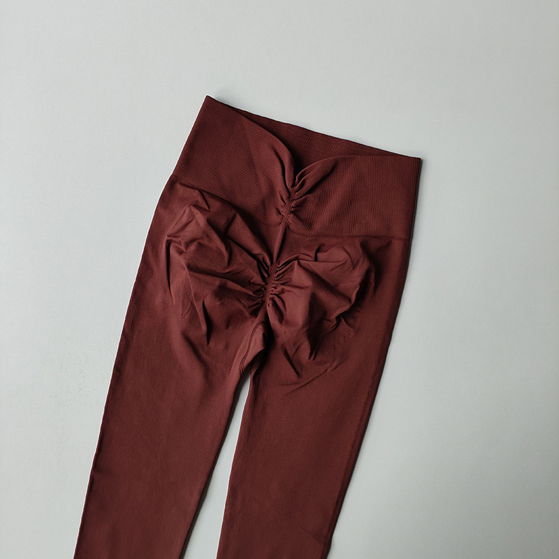 Nuevos pantalones de gimnasio elásticos de mujer desnudos apretados de cintura alta de miel de melocotón para correr pantalones deportivos de yoga