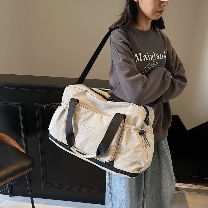 Nueva bolsa de viaje plegable de gran capacidad separación seca y húmeda bolsa deportiva de fitness bolsa de viaje portátil en espera de producción bolsa de mano