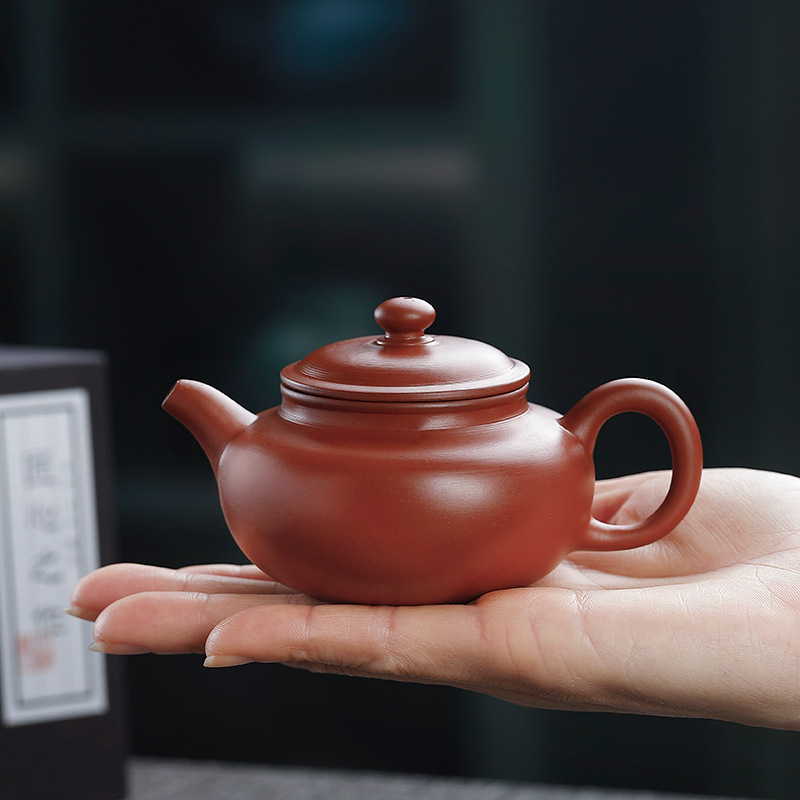 Chaozhou red robe hand-pulled pot handmade cinnabar purple sand teapot kung fu tea teapot brewing pot purple sand pot raw ore Chaozhou red robe hand-pulled pot handmade cinnabar purple sand teapot kung fu tea teapot brewing pot purple sand pot raw ore