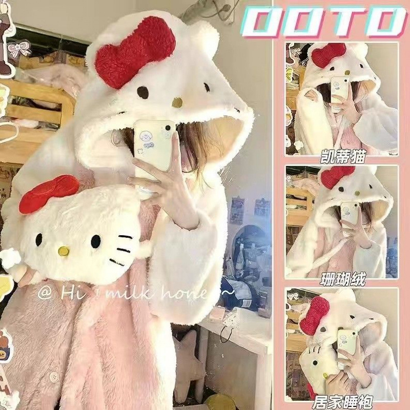 甘い蝶結びのお姫様風サンゴのパジャマの女性は冬に厚いベルベットの保温帽子の学生の家で寝ている服を着ている|undefined